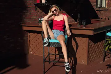 Blonde in Glasses and Shorts Spreads Her Legs Wide
