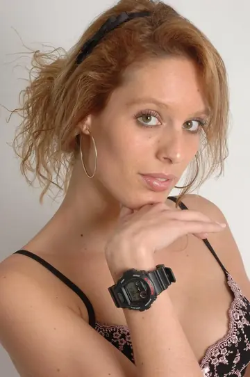Slim Redhead Restrained in Handcuffs and Lingerie
