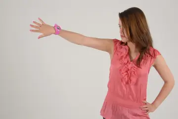 Woman Poses Fully Clothed Admiring Her Watch