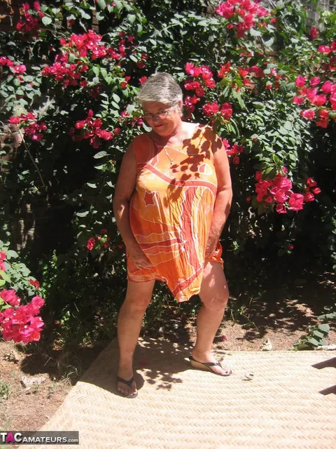 BBW Strips Out of Her Skirt on a Garden Patio – photo 1 of 20
