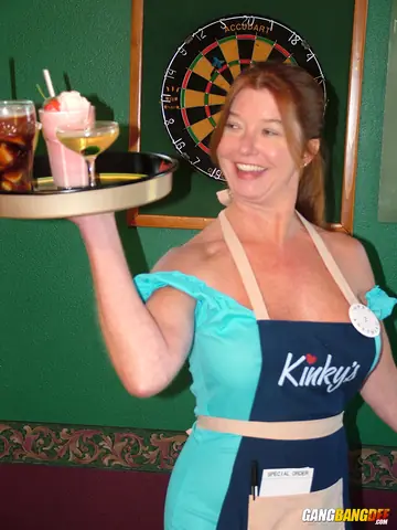 Busty Redhead MILF Goes Topless in Uniform