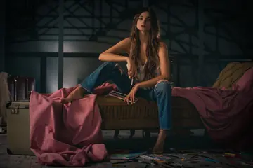 Skinny Brunette Strips Out of Her White Shirt in Jeans