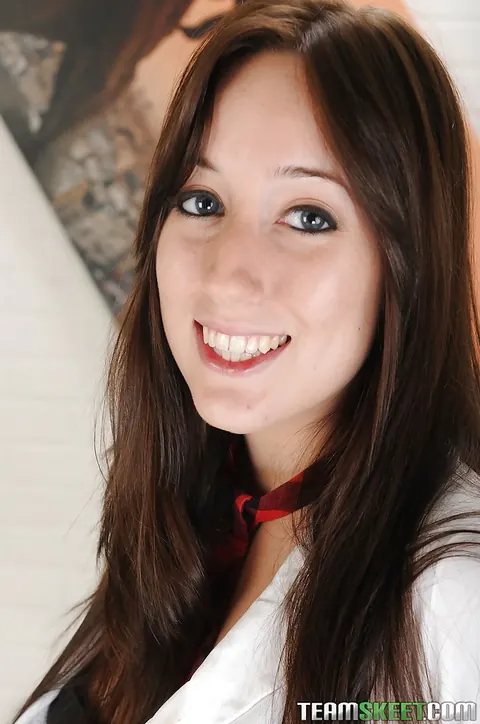 Jennifer Sloan: Brunette in a Red Skirt and Socks Poses and Shows Her Ass – photo 3 of 16
