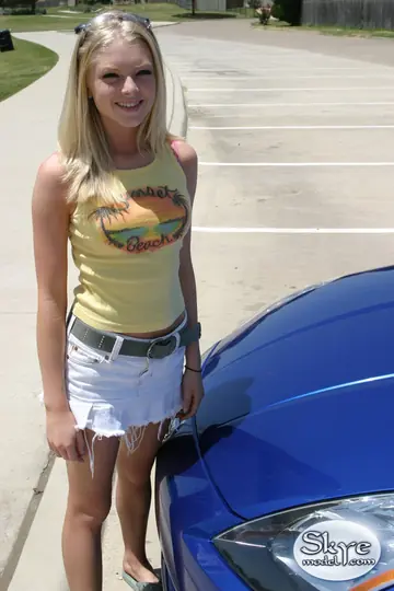 Blonde Strips Out of Her Skirt in the Car