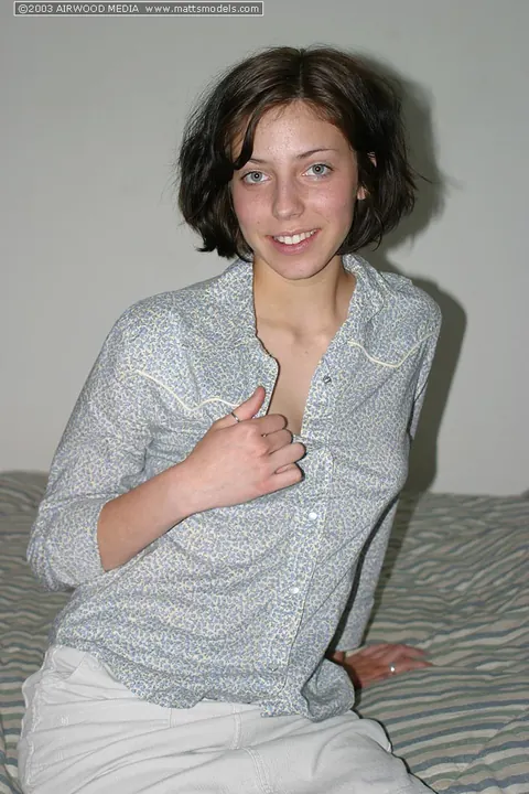Short-Haired Brunette Amateur Strips and Fingers in Bed – photo 4 of 16