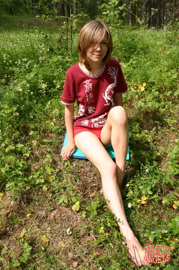 Russian Woman Strips Nude in the Forest