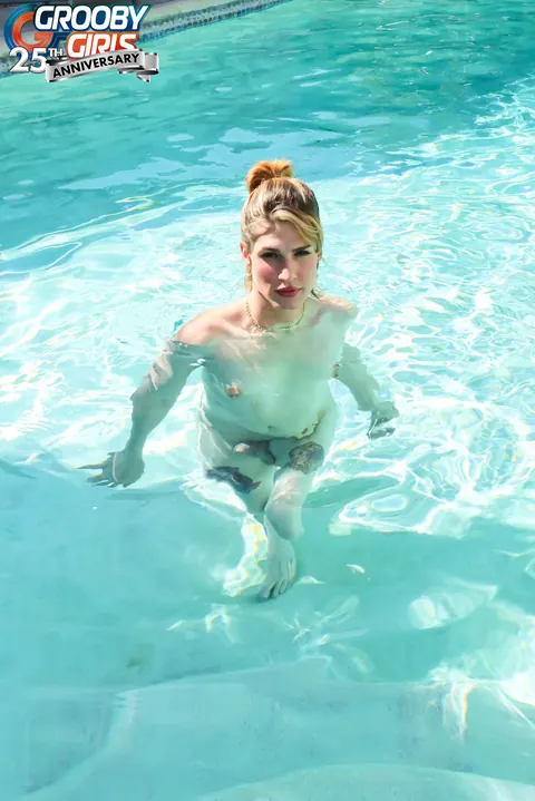 Thick Blonde Trans Woman Poses Nude by the Pool – photo 15 of 16