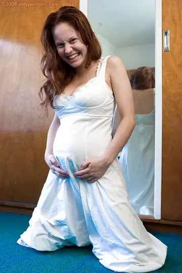 Pregnant Redhead with Big Tits Shows Her Hairy Pussy in Lingerie