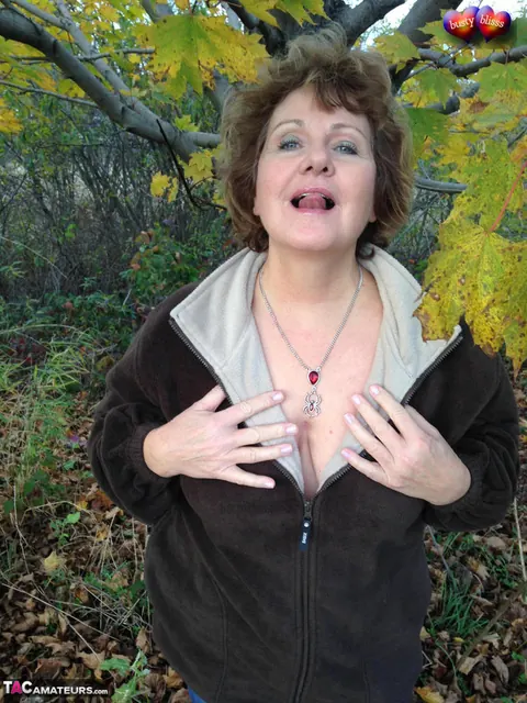 Bustybliss: Mature Curvy Brunette Undresses Outdoors Under a Tree – photo 3 of 20