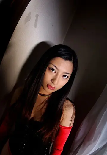 Japanese MILF Frees Her Small Tits from Latex Lingerie
