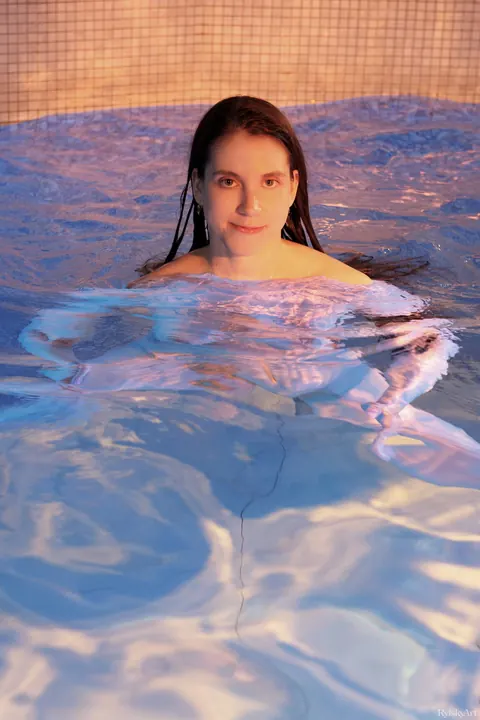 Woman Strips Nude Then Poses Standing and Lying – photo 16 of 21