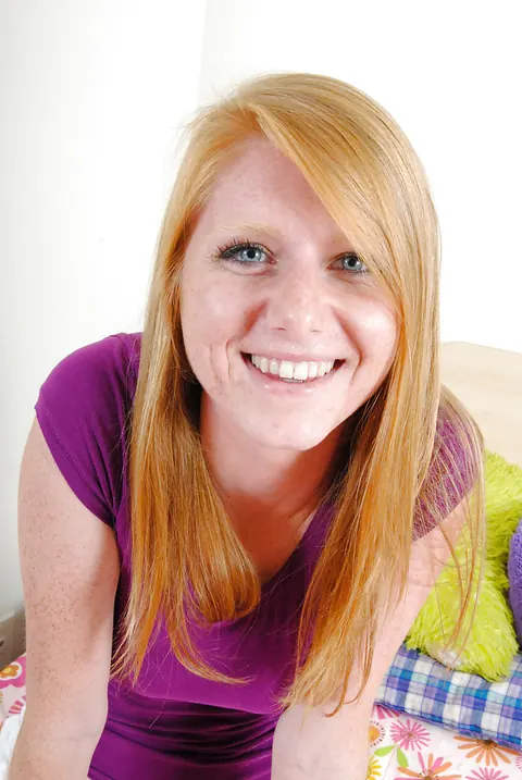 Tall Redhead Spreads Her Legs in a Skirt and Panties – photo 2 of 16