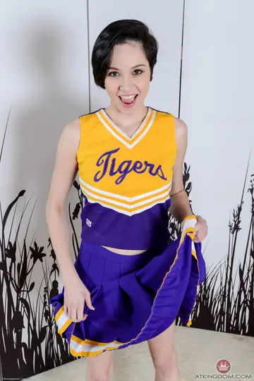 Petite Brunette with Short Hair and Tattoo Spreads Her Shaved Pussy