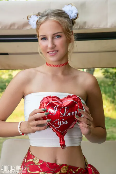 Blonde Strips Out of Her Panties and Spreads on a Bench Swing Outdoors – photo 3 of 20