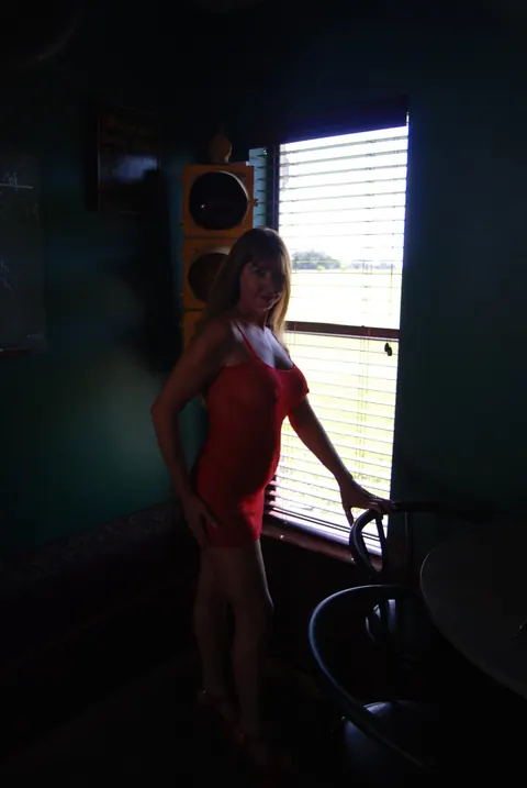 Mature Redhead Spreads Her Shaved Pussy in a Red Dress – photo 1 of 21