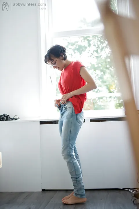 Yasmeena: Slim Asian Brunette Pulls on Panties and Jeans While Dressing – photo 15 of 16