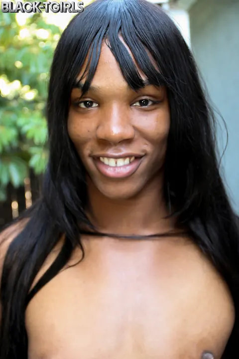 Ebony Trans Woman Lets Clothes Fall and Poses Nude Showing Her Cock – photo 16 of 16