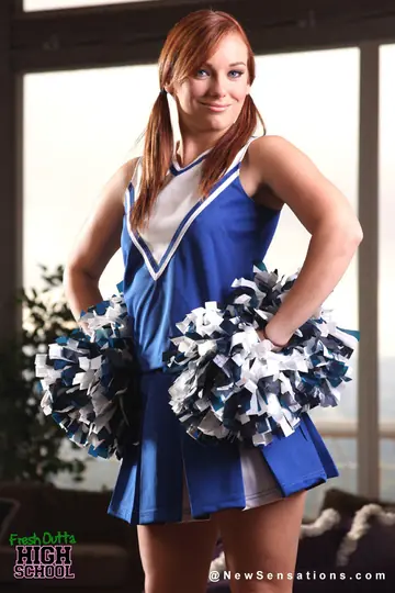 Redhead in Uniform Fucks Doggy Style and Takes Cum on Her Tits