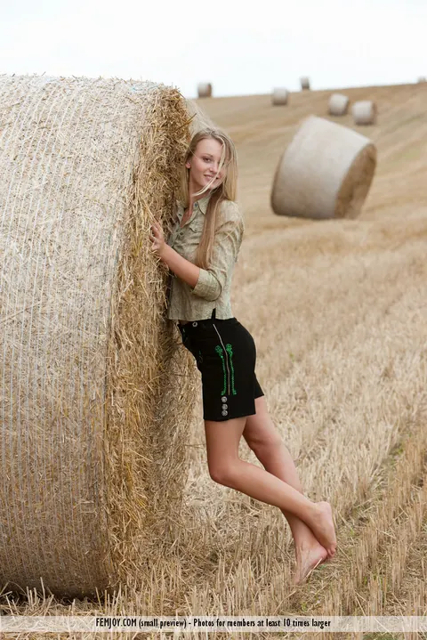 Carisha: European Blonde with Big Tits Undresses by a Hay Bale – photo 2 of 16