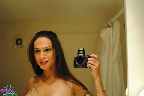 Mature Trans Woman Stands Nude and Displays Her Figure – photo 13 of 16