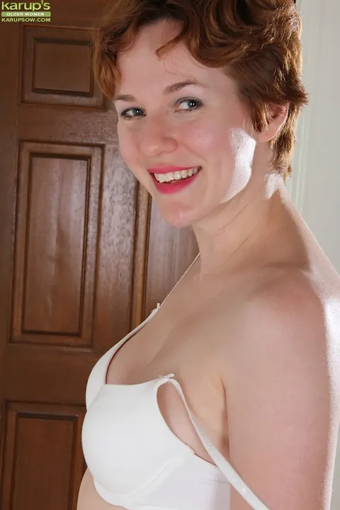 Busty Short-Haired MILF Undresses and Spreads Her Hairy Pussy – photo 3 of 16