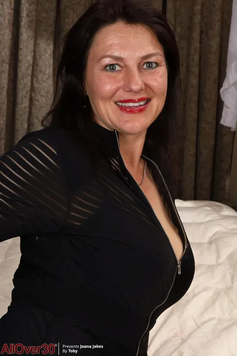 Joana Jakes: Mature Brunette MILF Undresses and Reveals Her Hairy Bush – photo 1 of 21