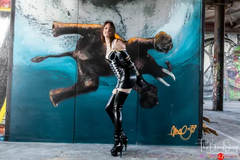 PAWG in a Latex Skirt and Heels Stands with Arms Bound – photo 7 of 16