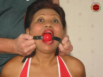 Mature Asian Woman in Pantyhose Restrained with Ball Gag