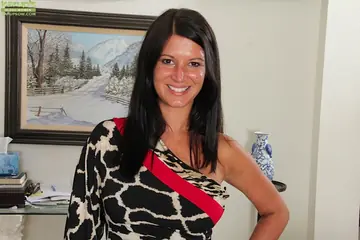 Busty Brunette MILF Strips Off Her Panties and Heels to Spread