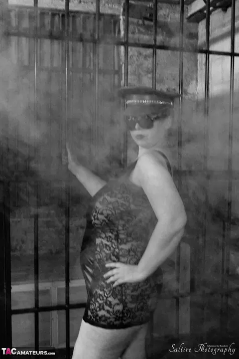 Posh Sophia: British MILF Poses in a Leather Skirt and Jail Costume – photo 3 of 16