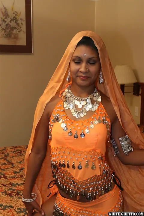 Thick Indian MILF Lifts Her Skirt and Flashes in the Bedroom – photo 2 of 15