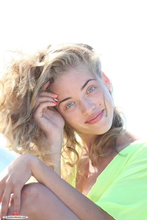 Petite Curly Blonde Undresses and Spreads on the Beach – photo 4 of 21