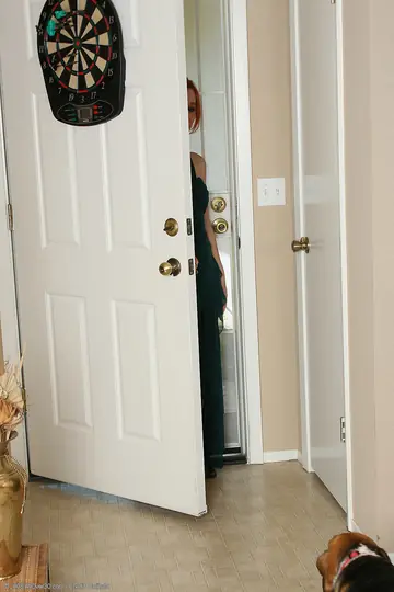 Redhead MILF Strips Out of Her Skirt and Spreads Her Pussy in Stockings