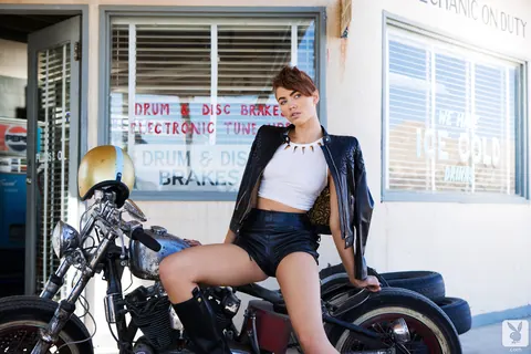Britt Linn: Redhead in Boots Spreads Outdoors by a Motorbike – photo 2 of 16