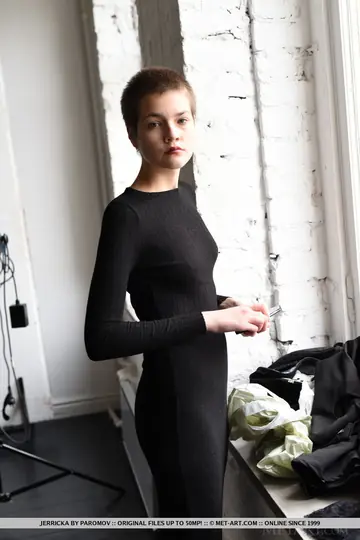 Short-Haired Woman Strips Out of Her Dress and Spreads Her Shaved Pussy