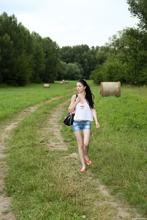 Mia Evans: Slim Hungarian Brunette Strips Out of Her Shorts in the Forest – photo 1 of 21