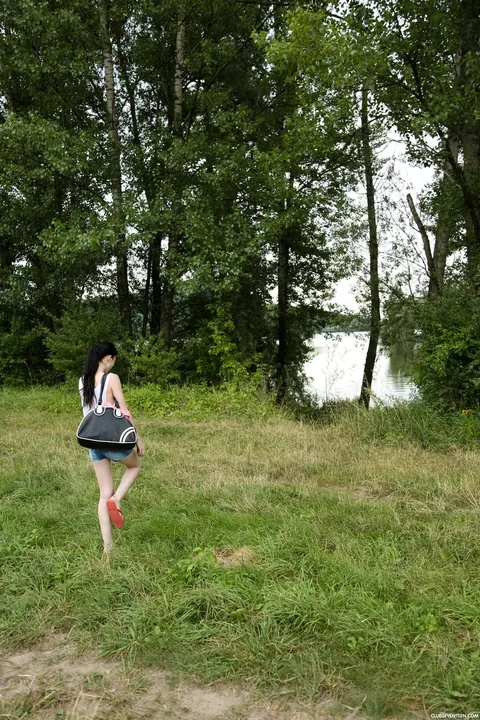 Mia Evans: Slim Hungarian Brunette Strips Out of Her Shorts in the Forest – photo 2 of 21