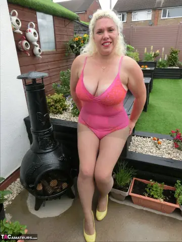 Mature Blonde MILF Flashes Her Big Tits and Masturbates in the Bedroom