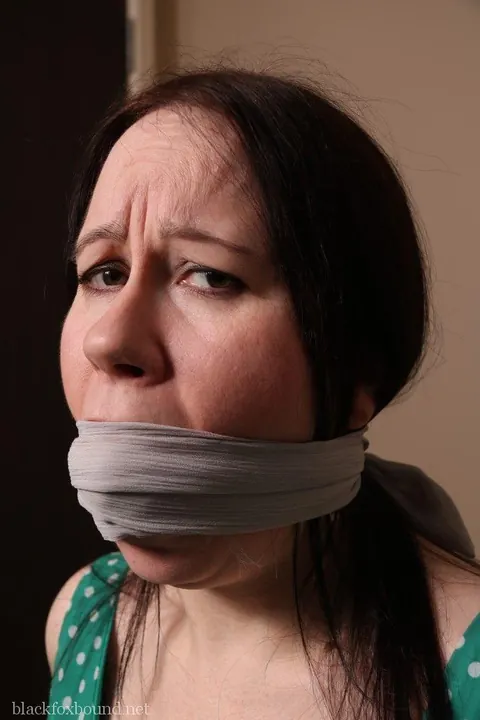 Mature Brunette Bound and Ball-Gagged in a Dress – photo 16 of 16