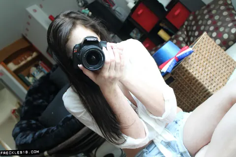 Brunette with Big Natural Tits Takes Mirror Selfies in Shorts – photo 1 of 12