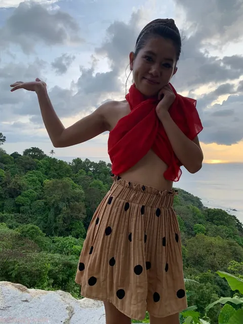 Petite Asian Woman Strips Out of Her Skirt Outdoors – photo 8 of 15