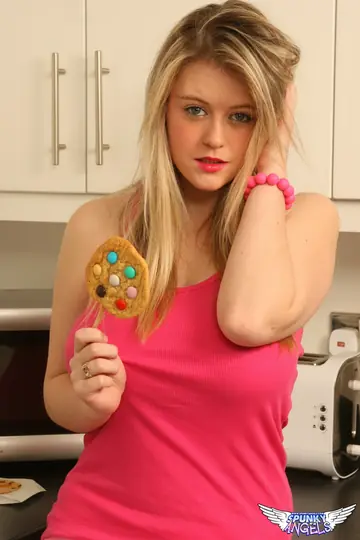 Blonde in a Miniskirt and Heels Shows Off Her Big Natural Tits