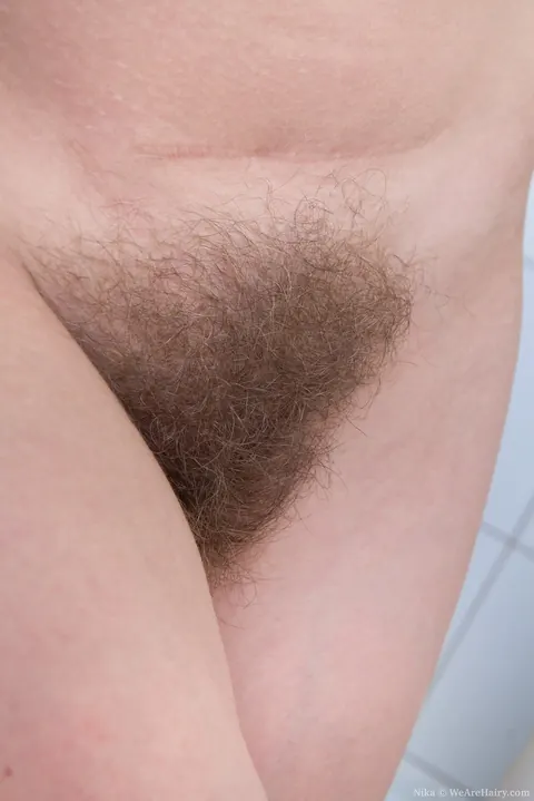 Busty Redhead Fingers Her Hairy Pussy Wide Open in the Bathroom – photo 8 of 16