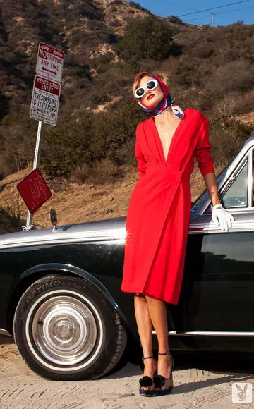 Tall Slim Blonde in Glasses Spreads Her Legs Outdoors by a Car