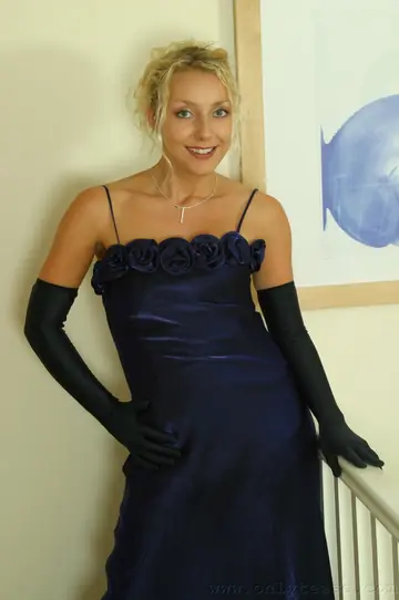 Busty Blonde with Short Hair in Stockings Spreads Her Pussy