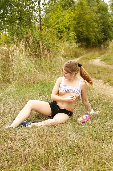 Woman Pulls Down Her Shorts and Masturbates in the Forest – photo 4 of 16
