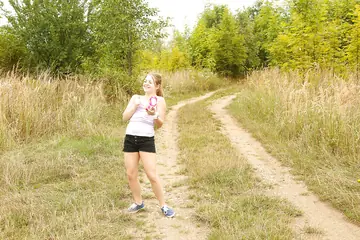 Woman Pulls Down Her Shorts and Masturbates in the Forest