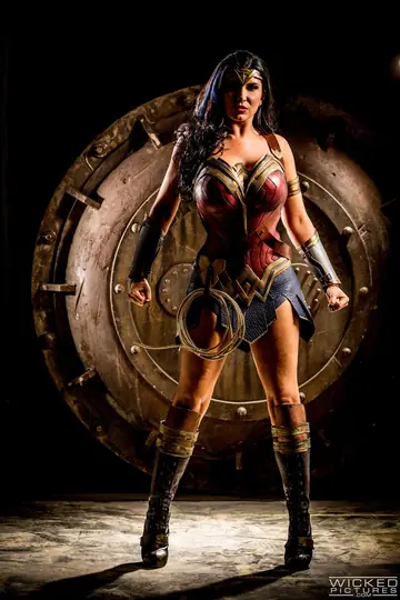 Busty Brunette MILF in Wonder Woman Cosplay Takes Gangbang Facials