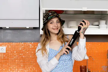 Tattooed Brunette Masturbates with a Dildo on the Kitchen Table