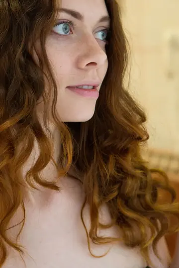 Skinny Curly Redhead Strips Out of Her Shorts and Shows Her Body